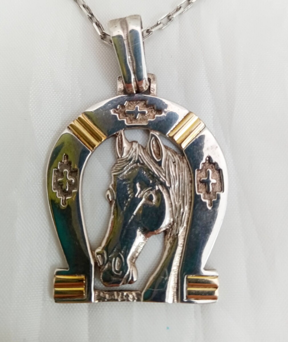Medalla caballo plata y oro 