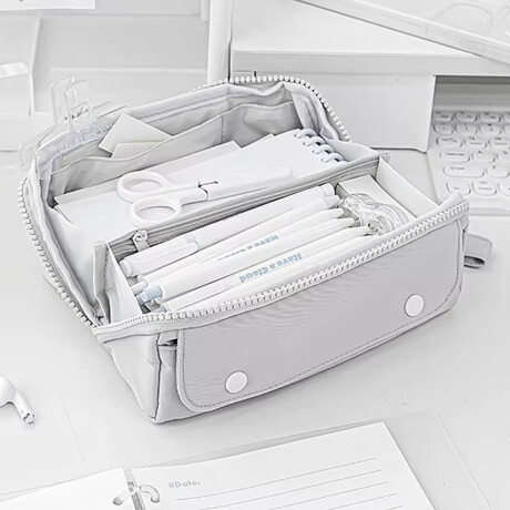 Cartuchera con divisiones y apertura completa Gris