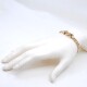 Pulsera en oro 18k combinada en 2 tonos con zafiro cabullon Pulsera en oro 18k combinada en 2 tonos con zafiro cabullon
