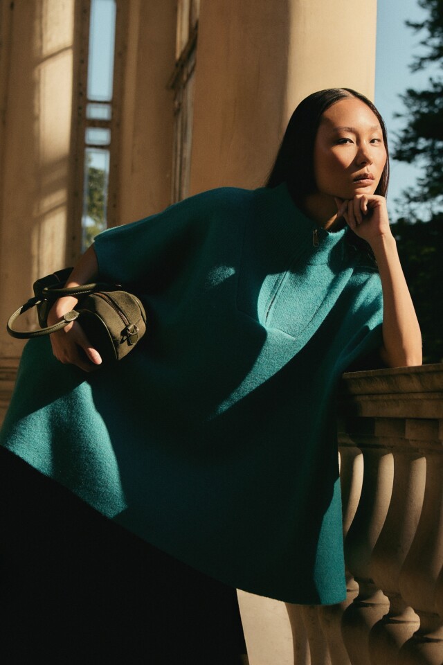 Sweater oversized con cierre verde petroleo