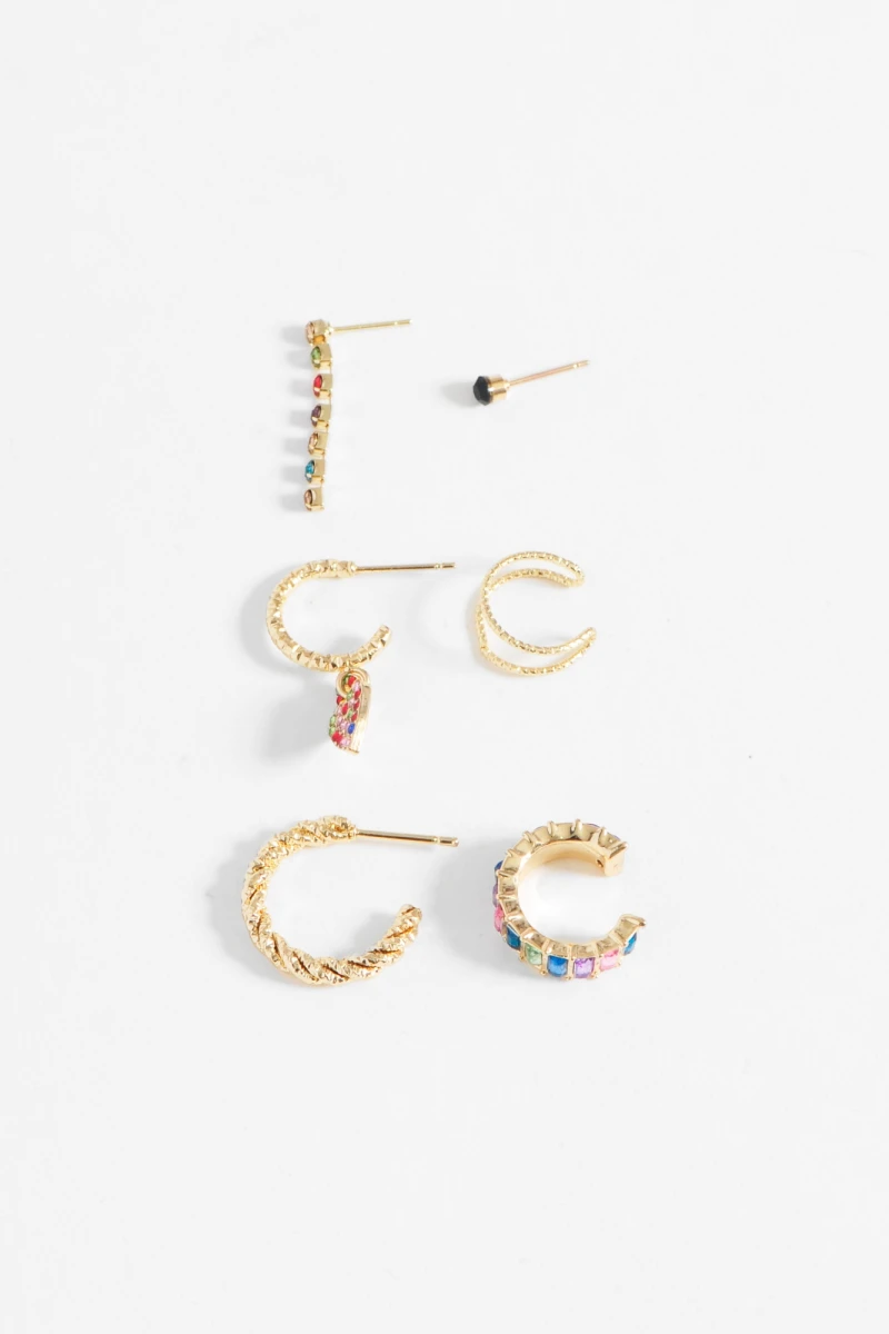 Set de seis aros y earcuff strass dorado