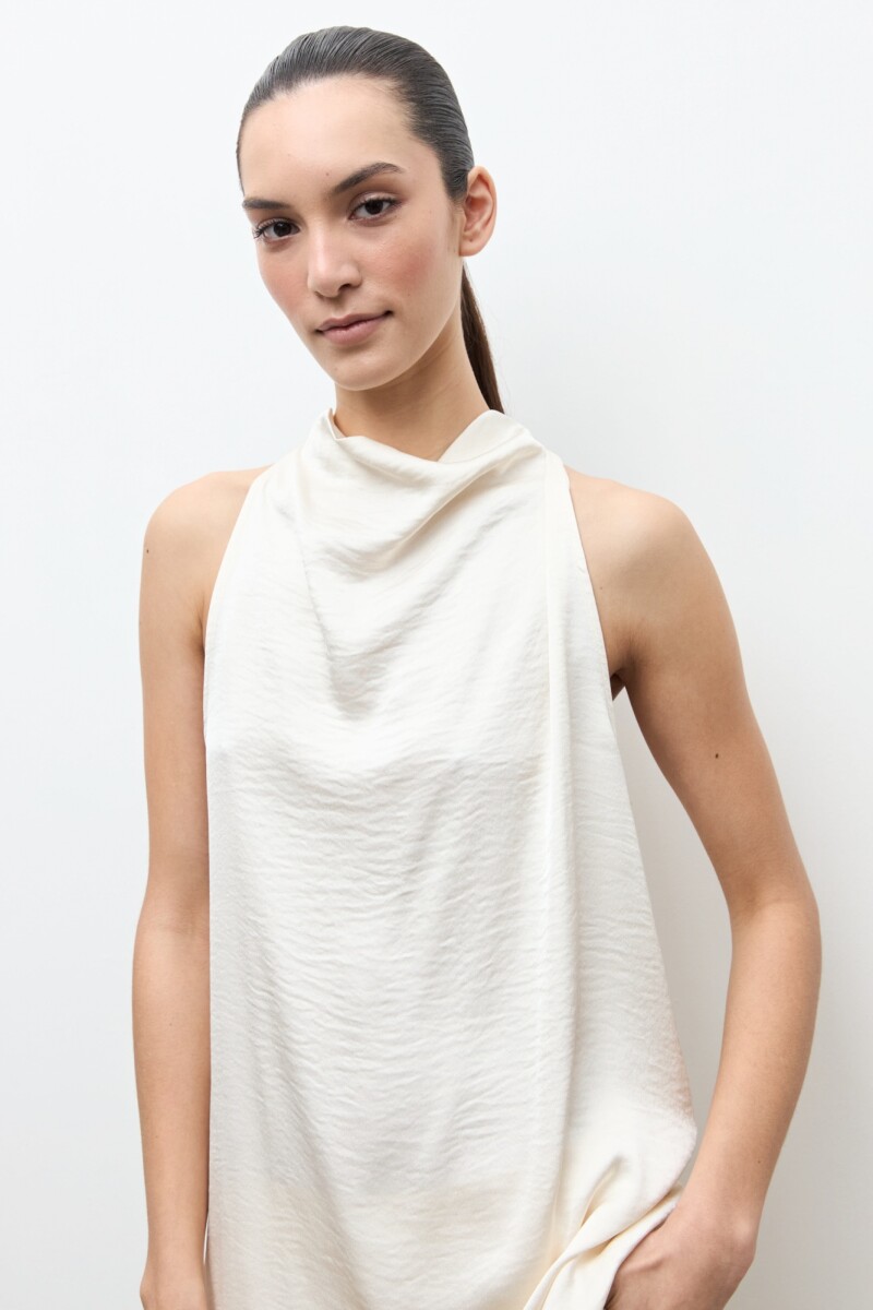 Blusa irregular crudo