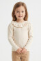 Sweater con volado CRUDO