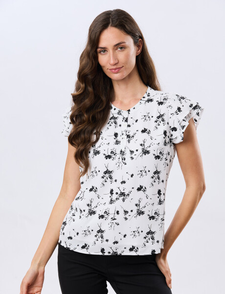 BLUSA CON VOLADOS Flor