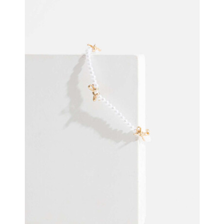 Pulsera De Perlas Con Moños Dorado