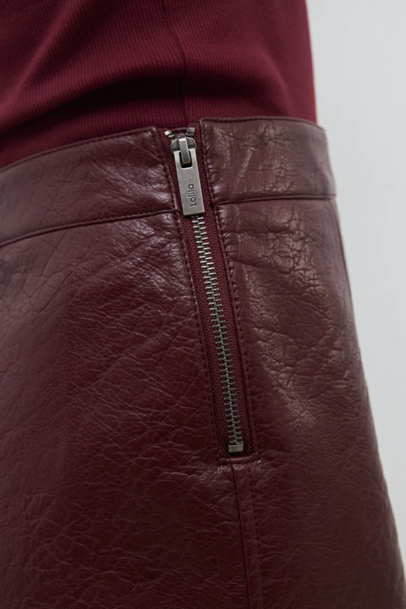 Minifalda eco-cuero bordo