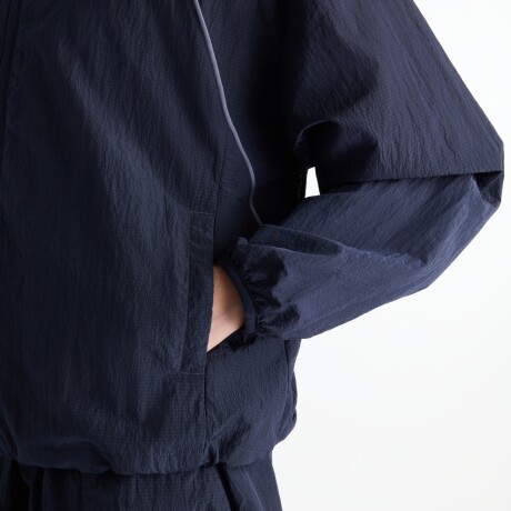 Campera New Balance de Dama - Sport Legacy - WJ6113KSDNT NAVY BLUE