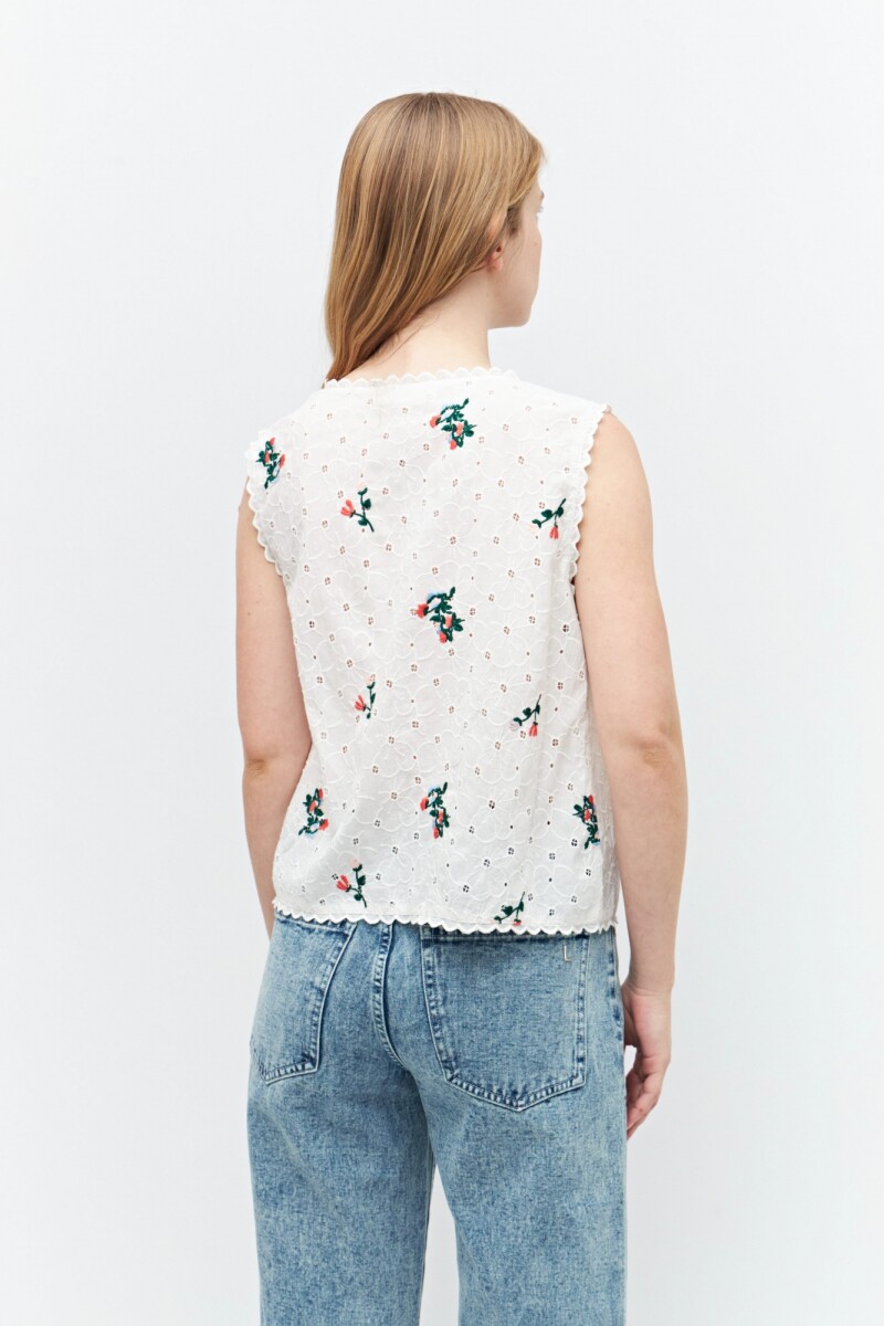 Top de broderie con bordados crudo