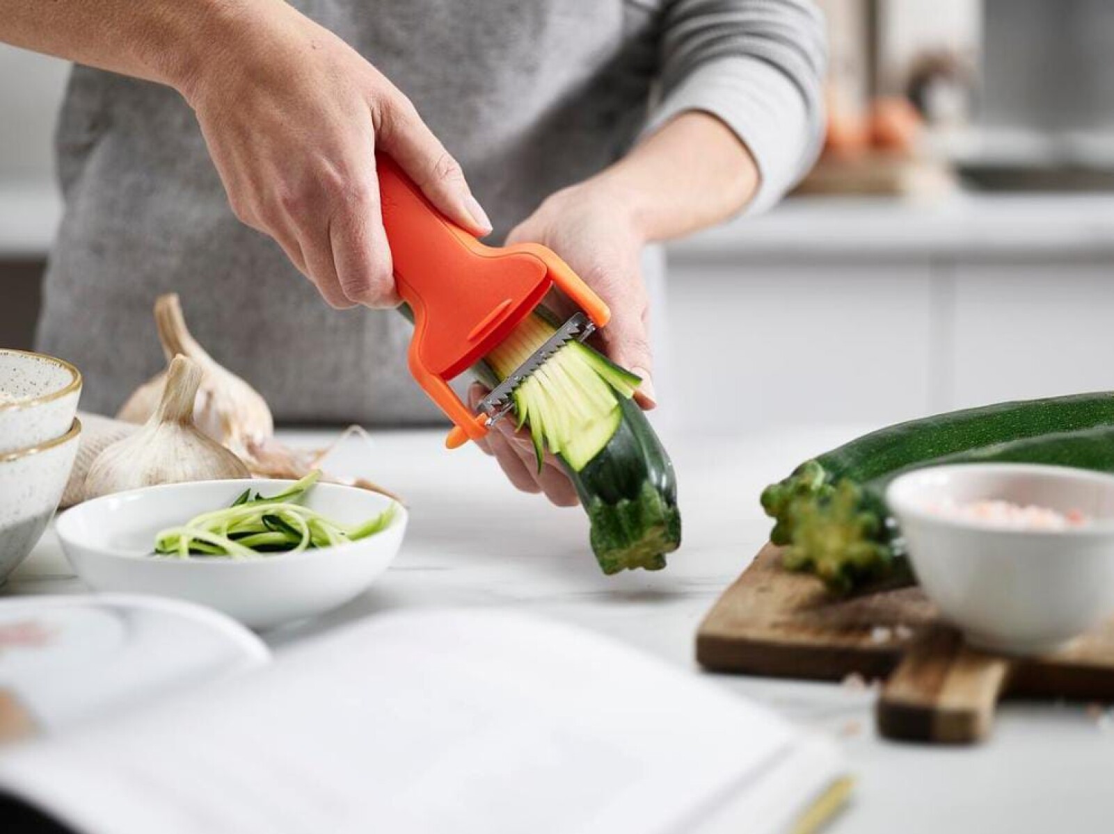 Pelador juliana SafeStore™ con protector integrado (naranja) 