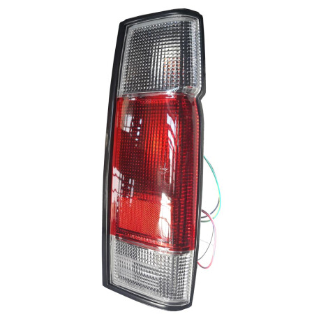 FAROL NISSAN TRAS DER. D21 2 COLORES CON OJO GATO - FAROL NISSAN TRAS DER. D21 2 COLORES CON OJO GATO -