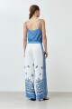 Pantalón estampado con guarda azul
