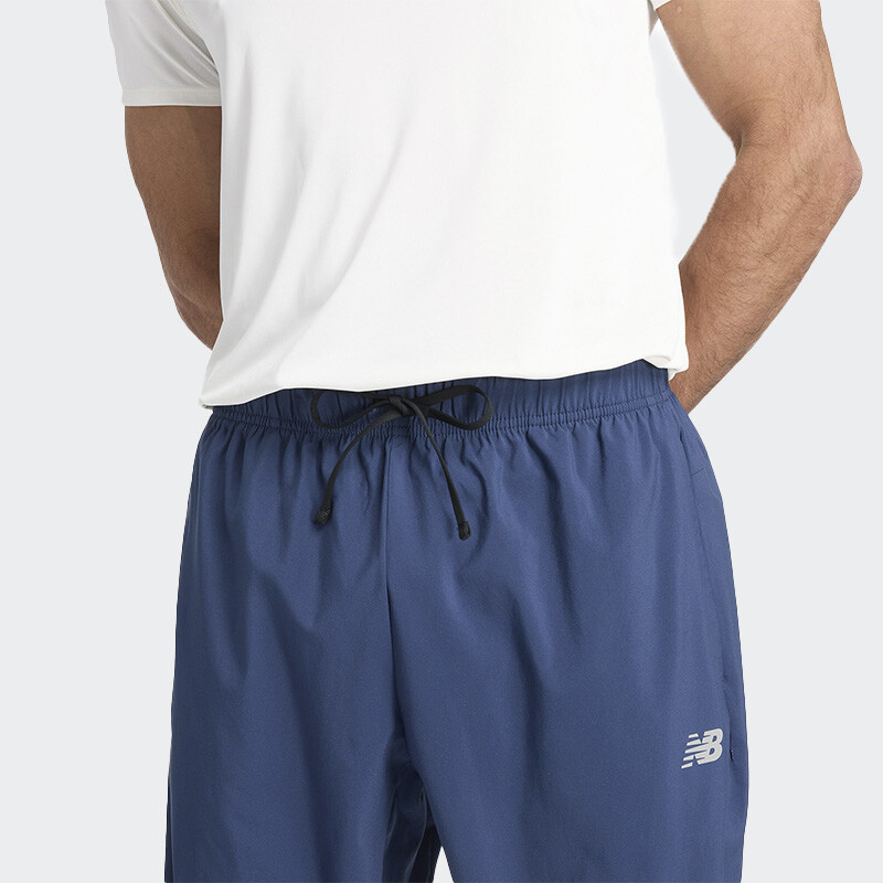 Pantalón New Balance Sport Essentials Woven Jogger Azul