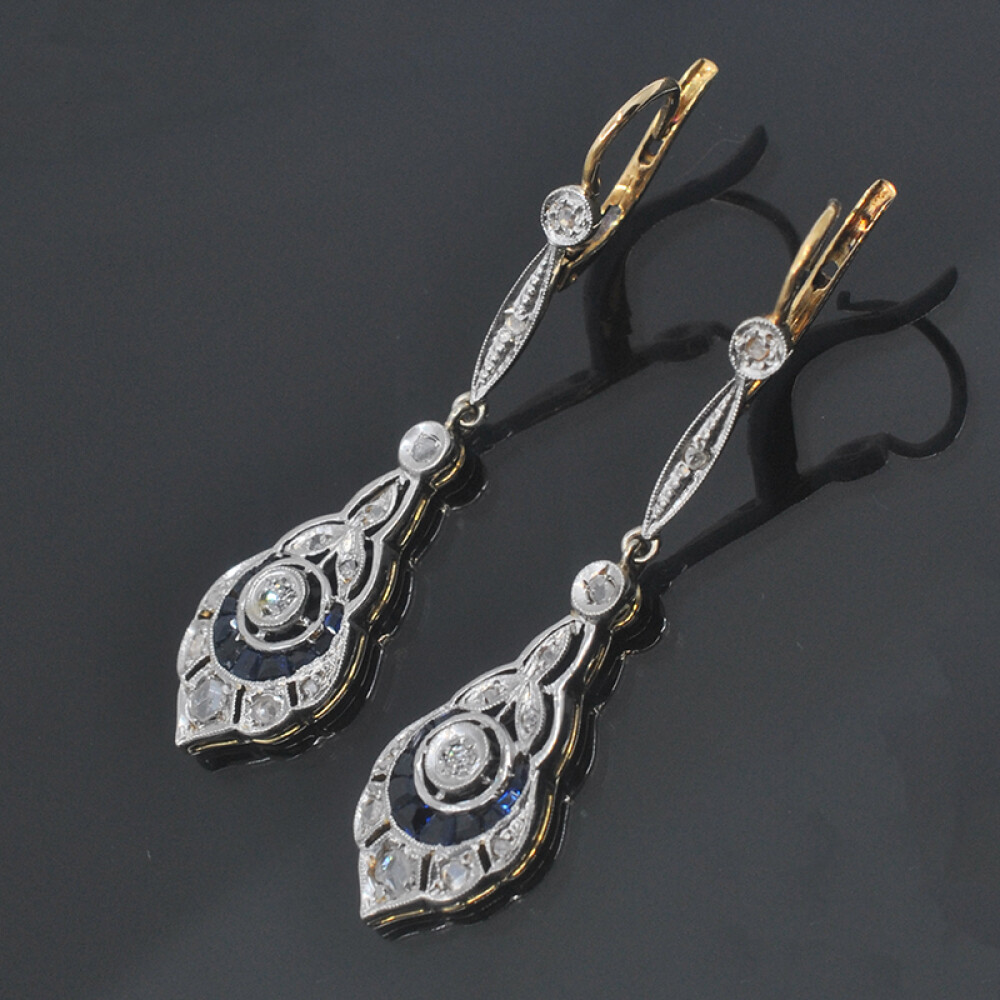 Caravanas oro 18k con brillantes, diamantes y zafiros sintéticos. Caravanas oro 18k con brillantes, diamantes y zafiros sintéticos.