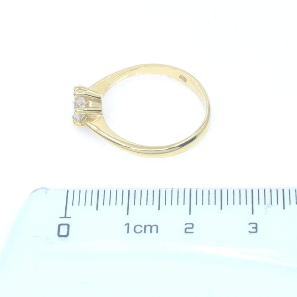 Anillo solitario en oro 18k y brillante con engarce de 6 puntas Anillo solitario en oro 18k y brillante con engarce de 6 puntas