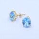 Caravanas oro 18k con topacios azules oval engarce 4 puntas. Caravanas oro 18k con topacios azules oval engarce 4 puntas.