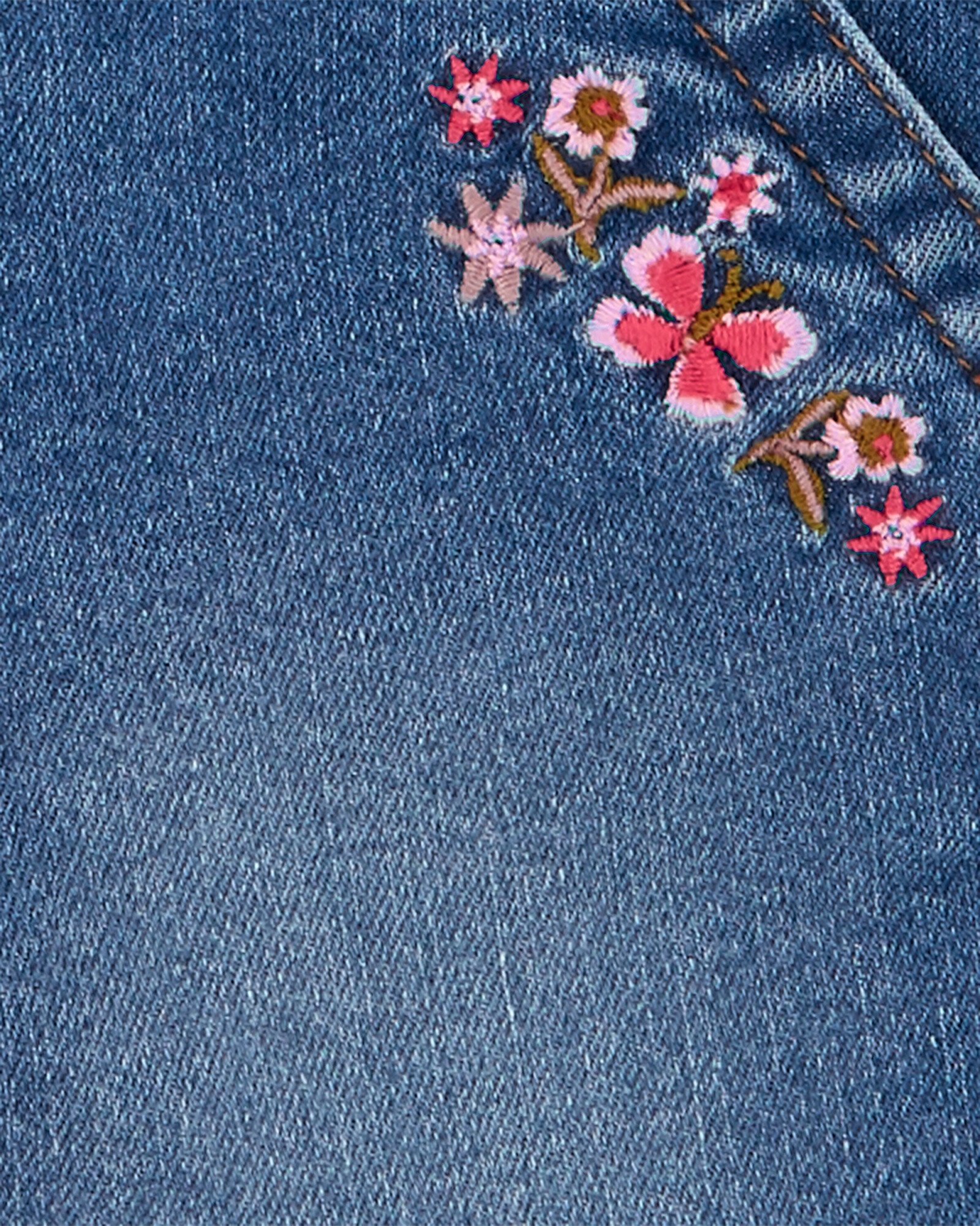 Enterito corto de jean con bordado. Talles 2-5T Sin color