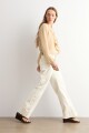 Blusa con volados beige