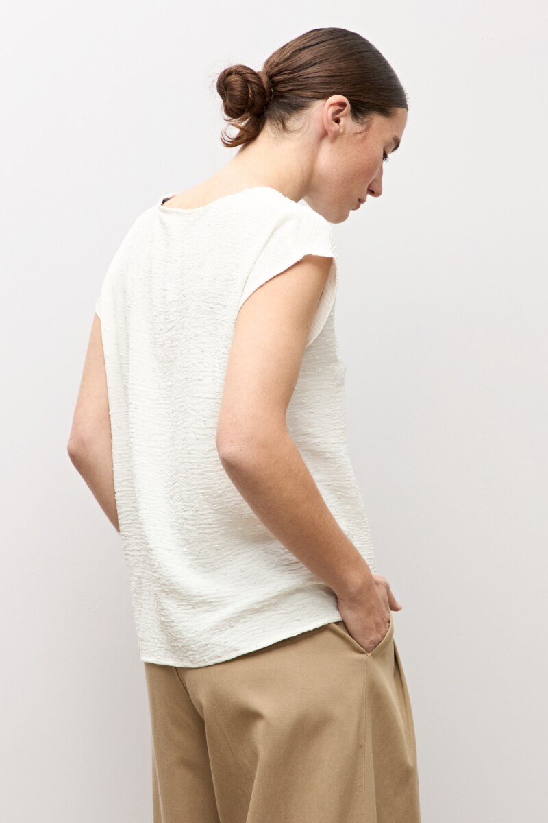 Blusa plumeti crudo