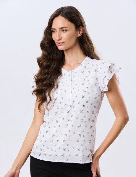 BLUSA CON VOLADOS Hojas Negra