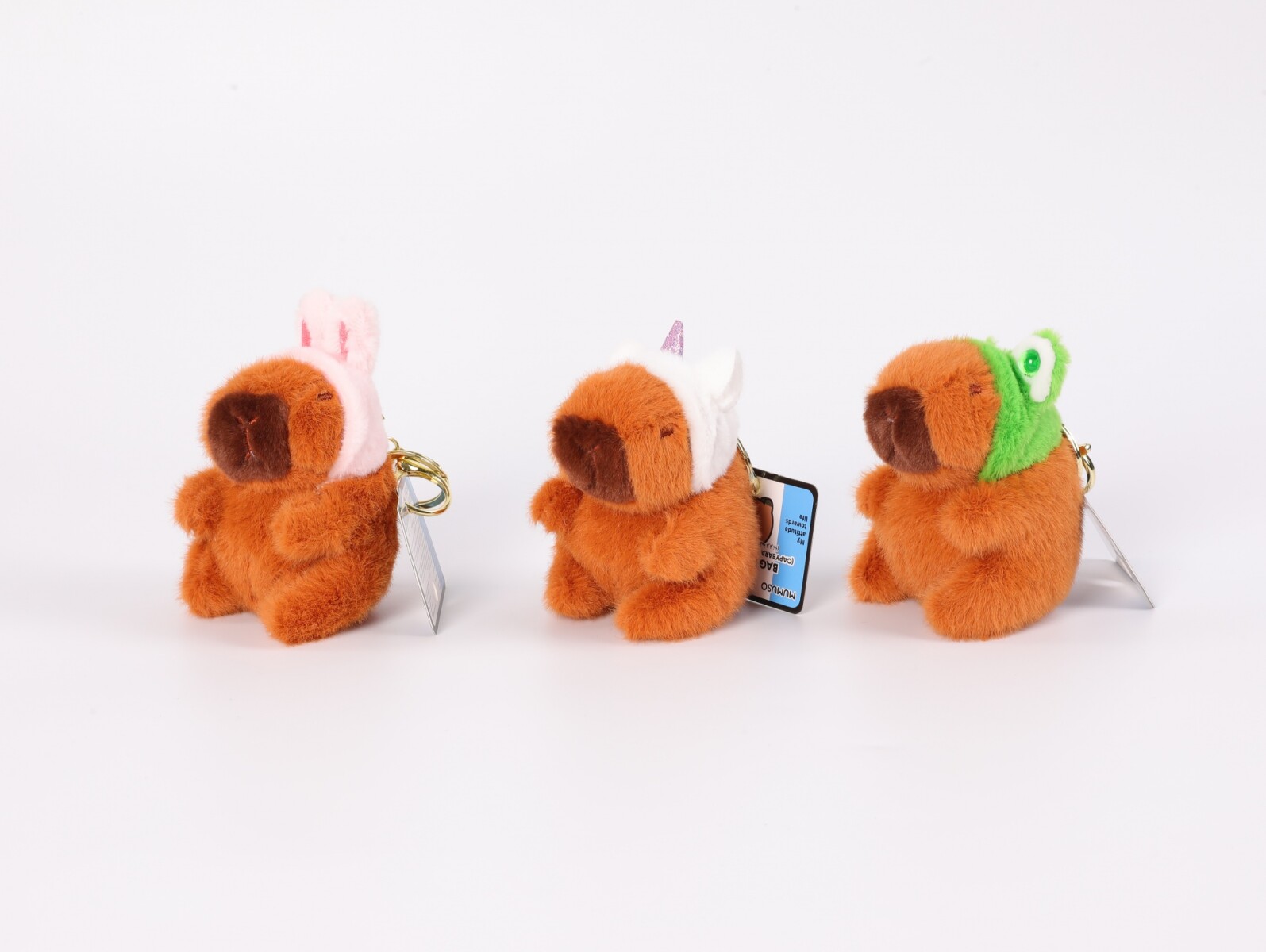 COLGANTE PARA BOLSO (CAPIBARA CON DIADEMA DE DIBUJOS ANIMADOS) 