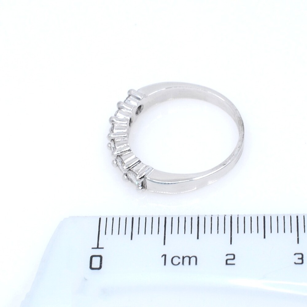 Anillo medio sin fin en oro 18k blanco y brillantes Anillo medio sin fin en oro 18k blanco y brillantes