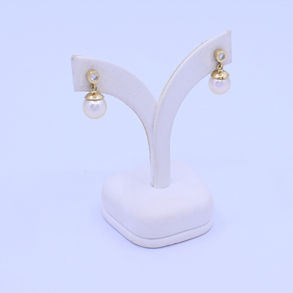 Caravanas oro 18 k con brillantes y perlas de cultivo. Caravanas oro 18 k con brillantes y perlas de cultivo.