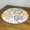 Individual Impermeable Circular Estampa Flores Mostaza