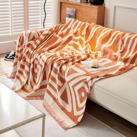 Manta sillón y cama triángulos 180x300cm naranja