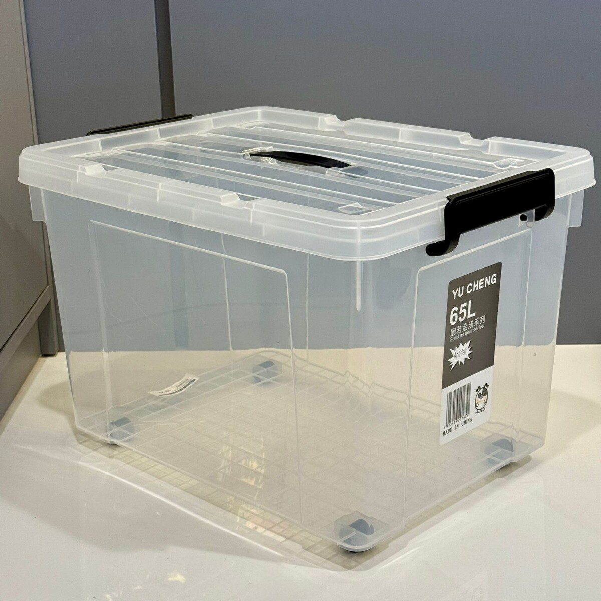 Caja de Almacenamiento Transparente con Rueditas 65L / 50cm x 39cm x 30cm 