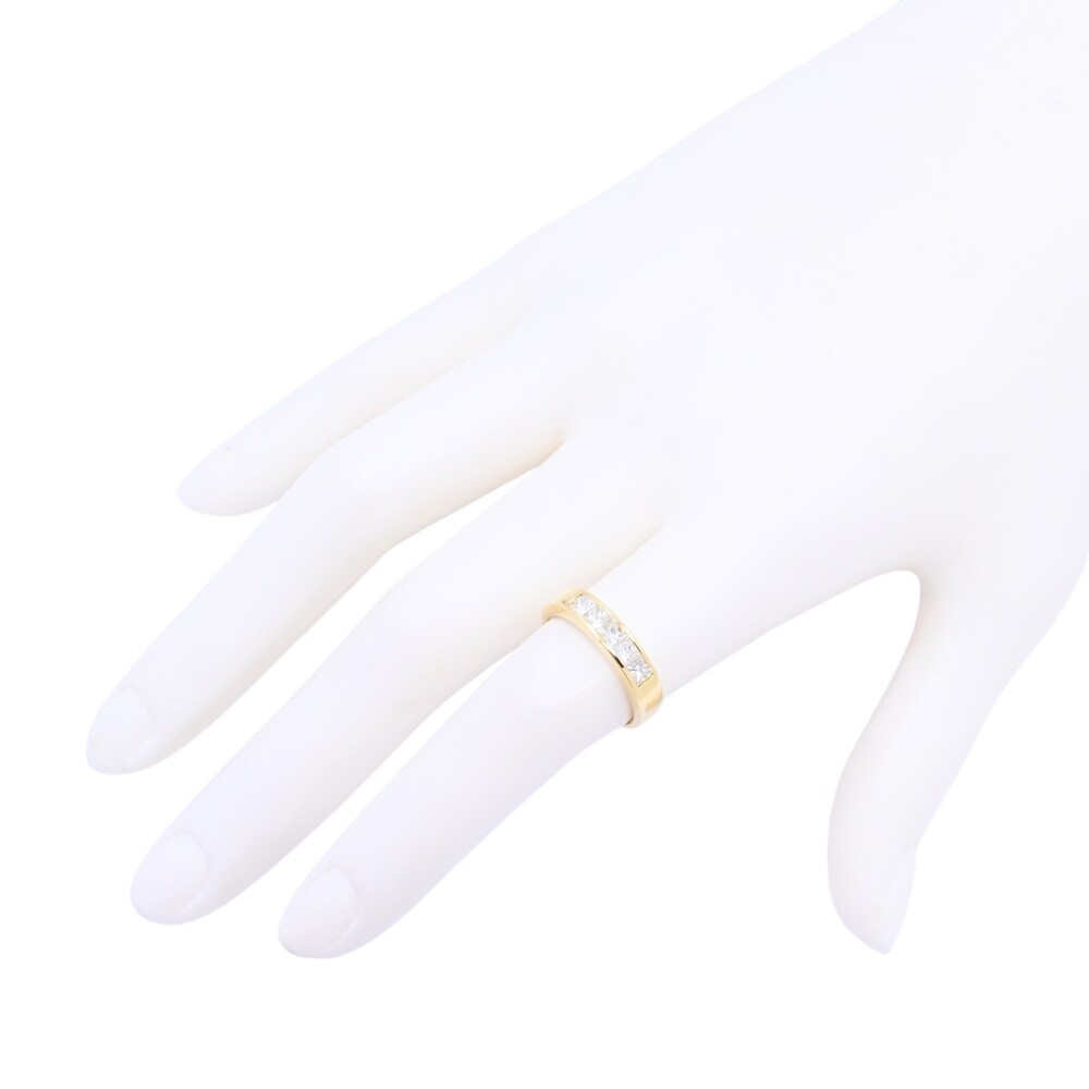 Anillo medio sin fin oro 18k amarillo carril con 5 brillantes princesa. Anillo medio sin fin oro 18k amarillo carril con 5 brillantes princesa.