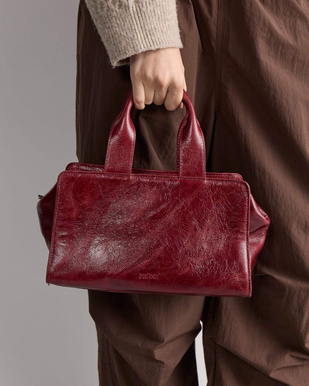 Cartera de mano Mila en cuero arrugado Bordeaux