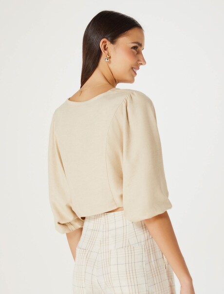 BLUSA CON MANGAS ABULLONADAS BEIGE