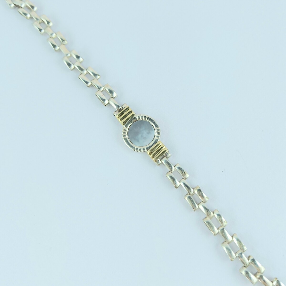 Pulsera de plata 925, double en oro 18 ktes y nácar. 