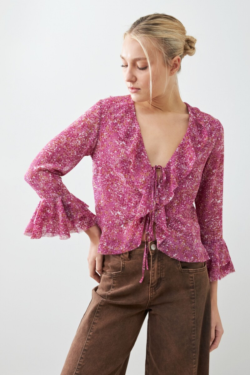 Blusa estampada con volados fucsia