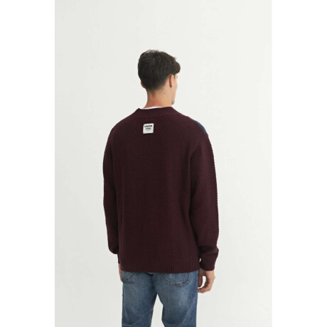 Buzo punto Damien Vino