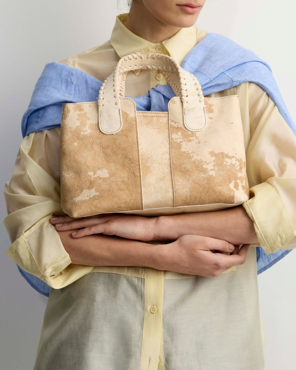 Cartera de mano The Braided en cuero vegetal liso Natural