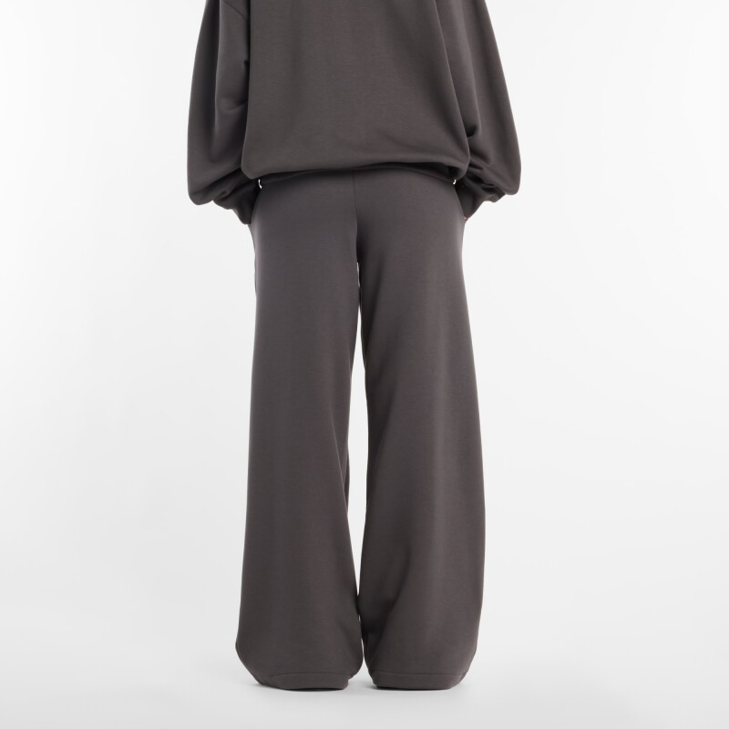 Pantalón New Balance de Dama -Reimagined Fleece- WB61I4PUABR DARK GREY
