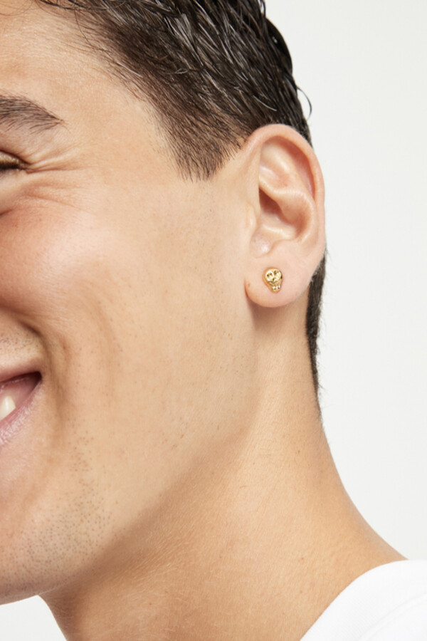 PIERCING DE ALEACIÓN DE METALES BAÑADO EN ORO 18K EN FORMA DE CALAVERA Piercing
