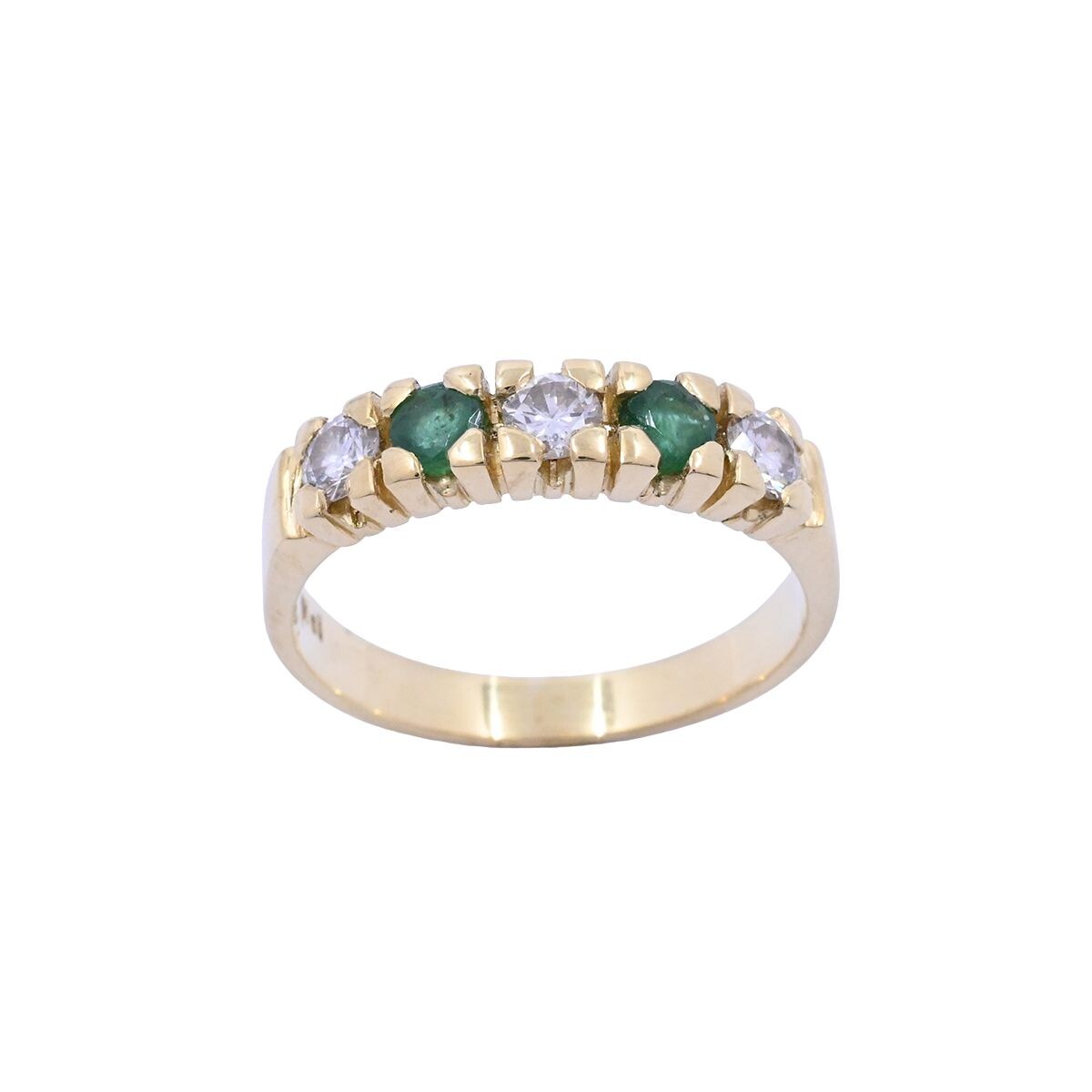 Anillo medio sin fin oro 18k amarillo con brillantes y esmeraldas engarce 4 puntas. 