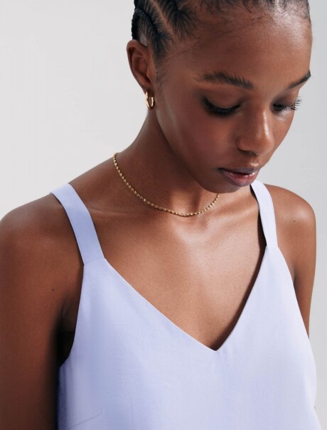 BLUSA SIN MANGAS CON ESCOTE EN V LILA