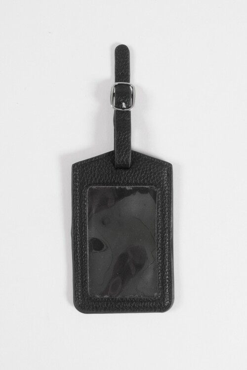 Tag de valija negro