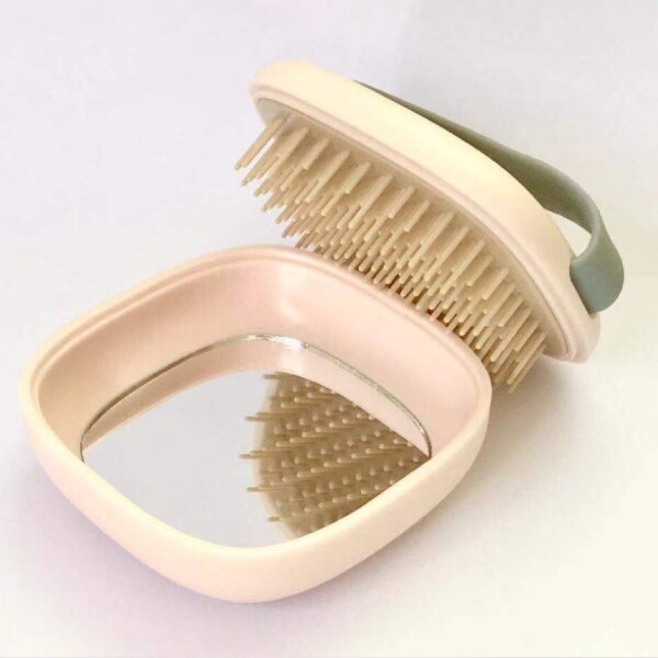 Cepillo desenredante para cabello rosa