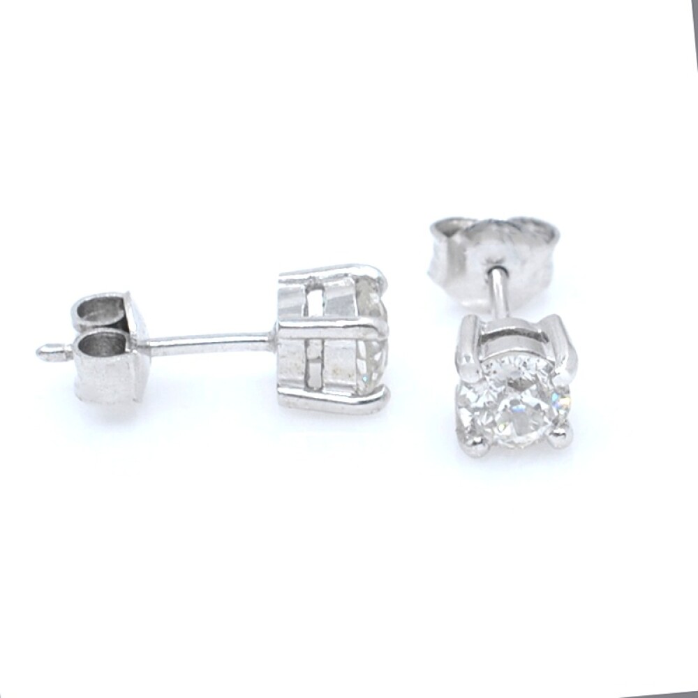 Caravanas en oro 18k blanco y brillantes. Caravanas en oro 18k blanco y brillantes.