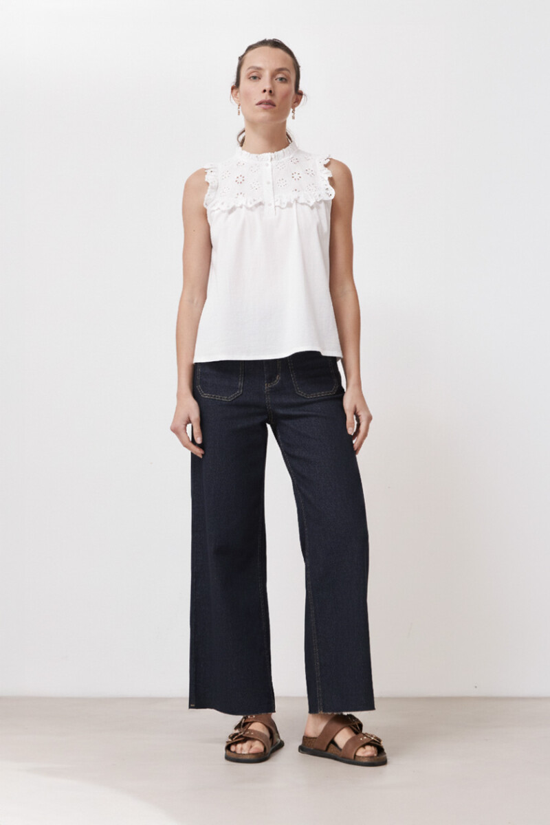 Top con broderie y volados blanco