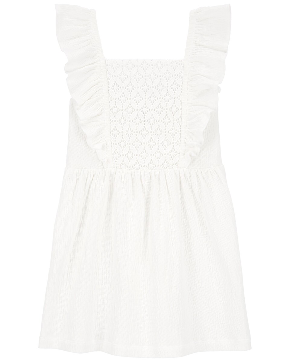 Vestido de jersey arrugado, con canesú a crochet. Talles 2-5T 