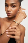 PULSERA RÍGIDA FINA DE ALEACIÓN DE METALES BAÑADA EN ORO 18K CON DOS CRISTALES FACETADOS MULTICOLOR Pulsera