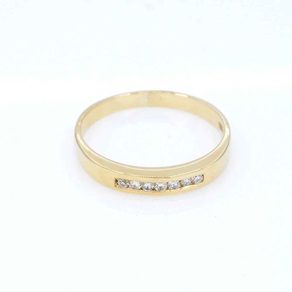 Anillo en oro 18k y 7 brillantes Anillo en oro 18k y 7 brillantes
