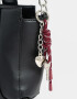 City Cartera City Con Charm - Negro