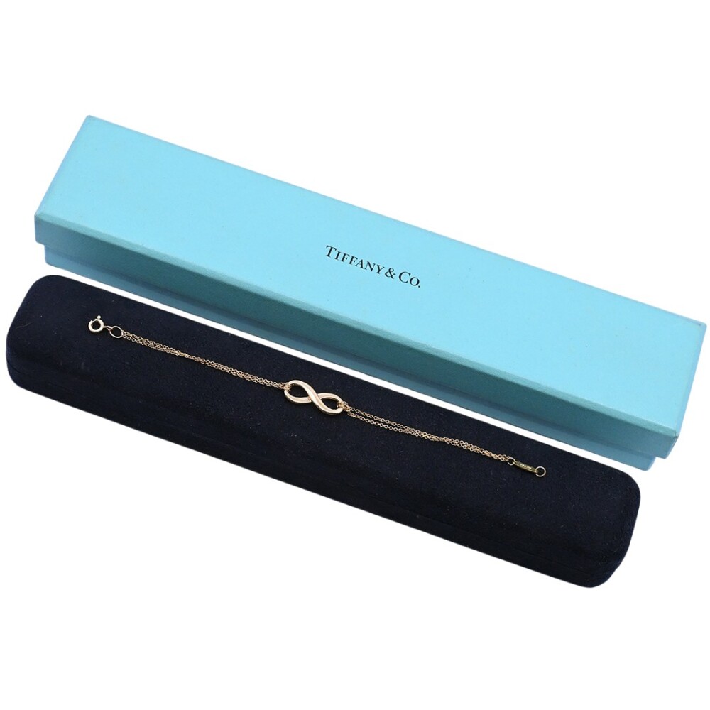 Tiffany & Co. Pulsera infinity oro 18 k amarillo con estuche. Tiffany & Co. Pulsera infinity oro 18 k amarillo con estuche.