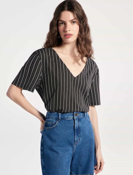 BLUSA DE CUELLO EN V CON ESTAMPADO AZUL